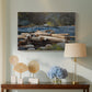 Canvas art print featuring a natural composition with river and distant shoreline, displayed above a styled console table