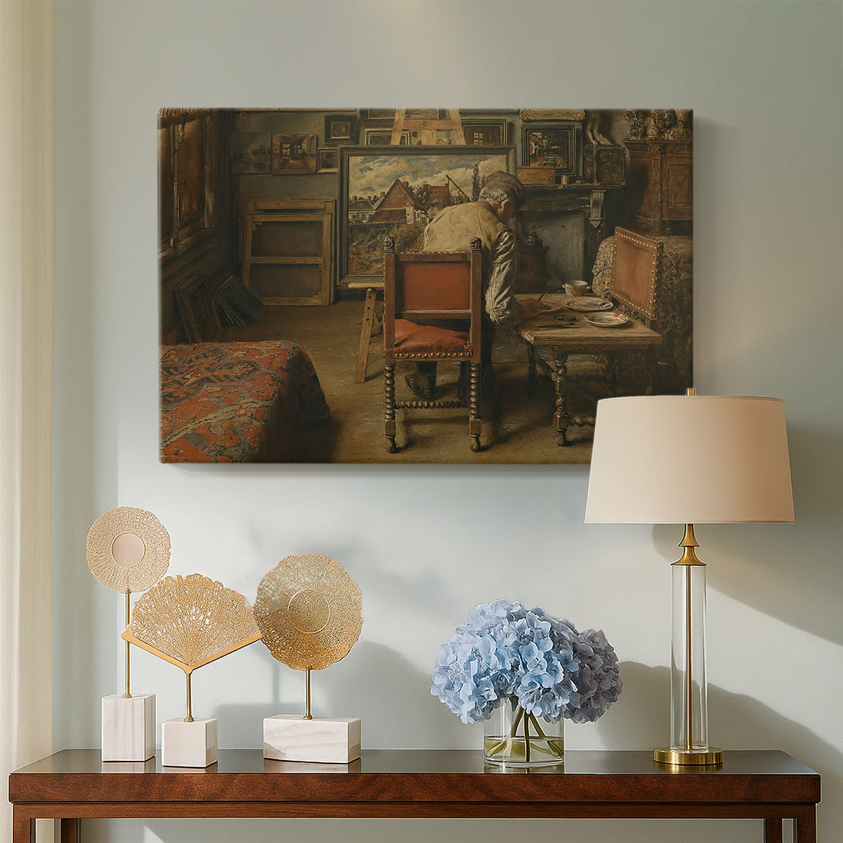 Canvas art print featuring a craftsman focused on detailed work with tools and materials, displayed above a styled console table
