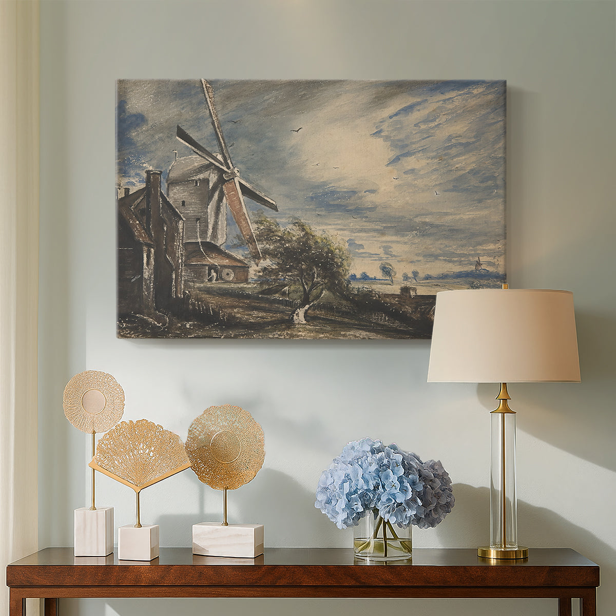 Canvas art print featuring a landscape combining rustic architecture, displayed above a styled console table