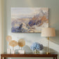 Canvas art print featuring a panoramic alpine view with snow and rocky cliffs, displayed above a styled console table