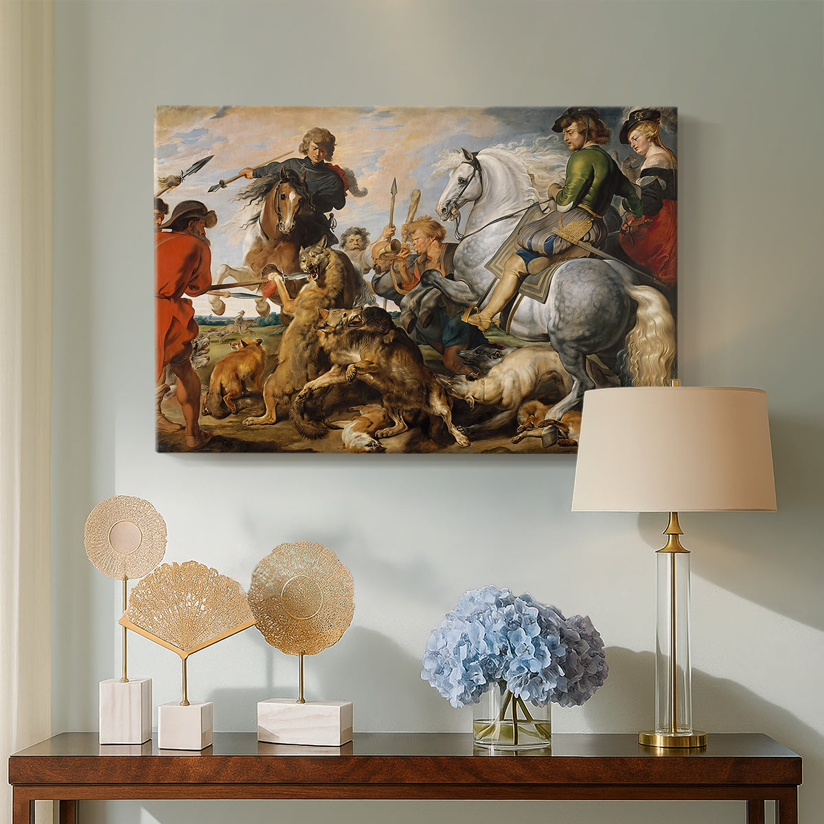 Canvas art print featuring a Baroque action scene with hunters and animals, displayed above a styled console table