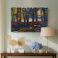 Canvas art print featuring a semi-abstract composition with trees and layered brushwork, displayed above a styled console table