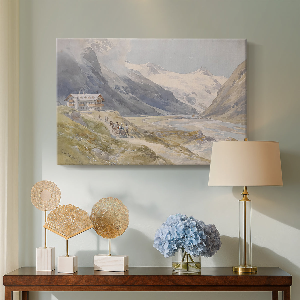 Canvas art print featuring a rural alpine setting with shepherds and open terrain, displayed above a styled console table