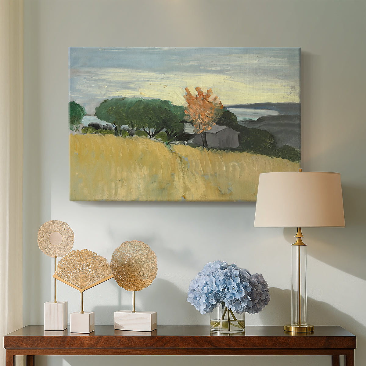 Canvas art print featuring a bright countryside scene with field and soft sky, displayed above a styled console table