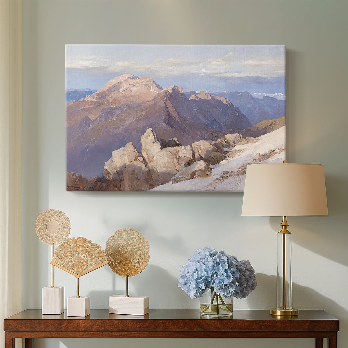 Canvas art print featuring a high vantage point overlooking rugged mountain terrain, displayed above a styled console table