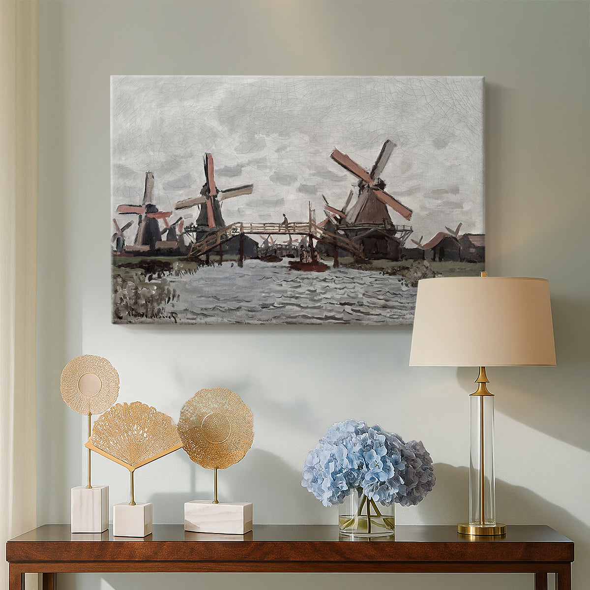 Canvas art print featuring a countryside scene with traditional windmills and reflections, displayed above a styled console table