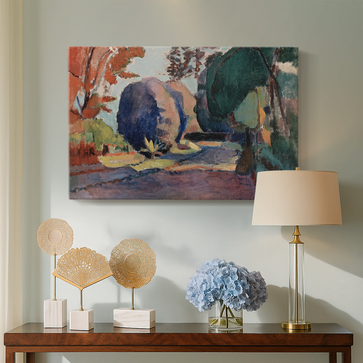 Canvas art print featuring a stylized garden composition with vegetation, displayed above a styled console table