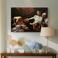 Canvas art print featuring an intense moment of Judith slaying Holofernes with sword, displayed above a styled console table