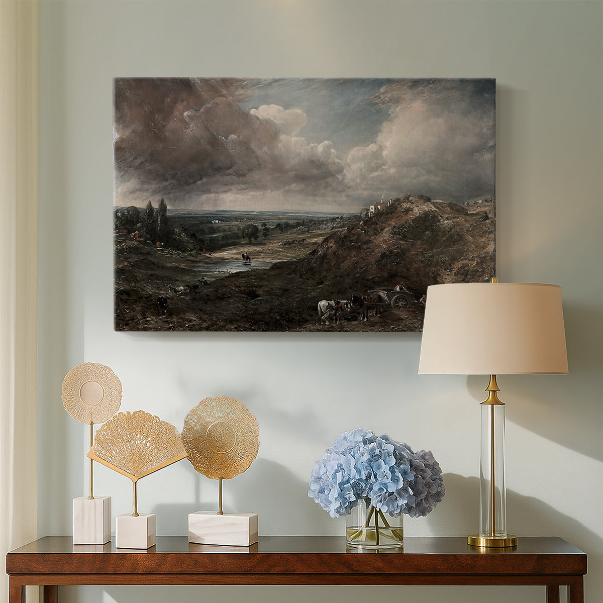 Canvas art print featuring an atmospheric landscape with pond, displayed above a styled console table