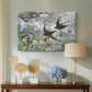Canvas art print featuring a multiple birds flying together in natural outdoor scene, displayed above a styled console table