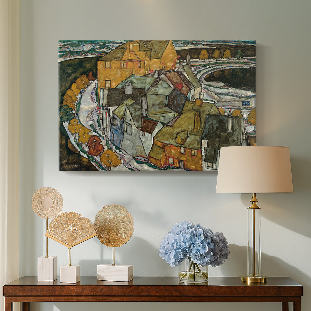 Canvas art print featuring an expressionist depiction of island town with geometric forms, displayed above a styled console table