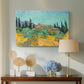 Canvas art print featuring a post-impressionist composition combining architecture and nature, displayed above a styled console table