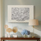 Canvas art print featuring a patterned surface featuring stylized flowers and leaves, displayed above a styled console table