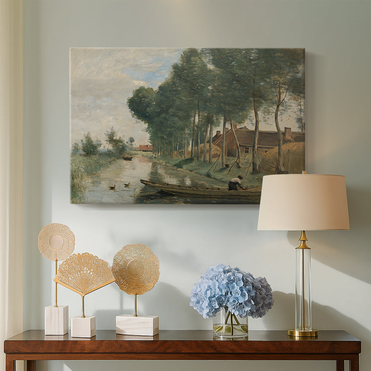 Canvas art print featuring an atmospheric landscape with trees and distant horizon, displayed above a styled console table