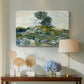 Canvas art print featuring a post-impressionist scene with rugged ground and minimal vegetation, displayed above a styled console table