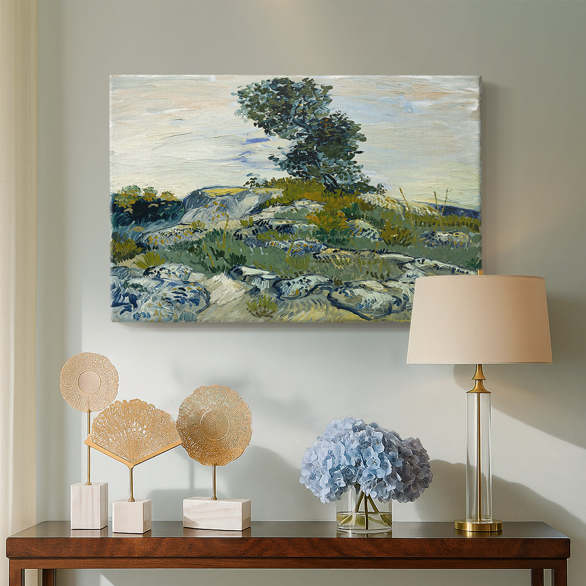 Canvas art print featuring a post-impressionist scene with rugged ground and minimal vegetation, displayed above a styled console table