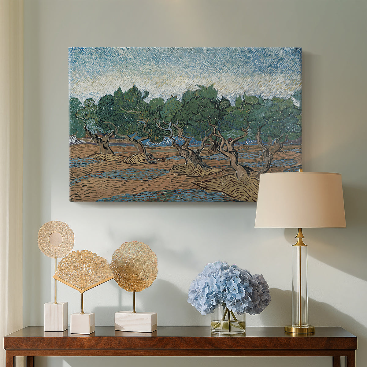 Canvas art print featuring a post-impressionist scene emphasizing movement in foliage, displayed above a styled console table