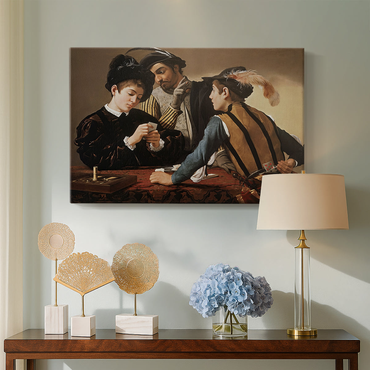 Canvas art print featuring a young men playing cards with one cheating and another watching closely, displayed above a styled console table