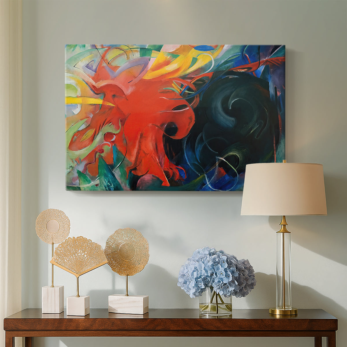 Canvas art print featuring a colorful abstract scene suggesting conflict through movement, displayed above a styled console table