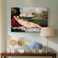 Canvas art print featuring a serene figure resting in natural setting with flowing form, displayed above a styled console table