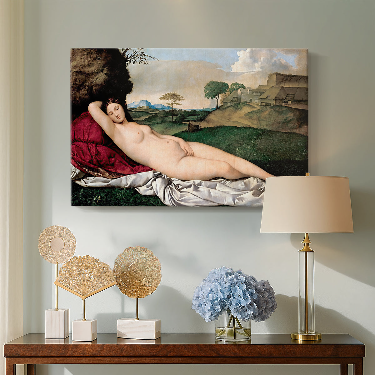 Canvas art print featuring a serene figure resting in natural setting with flowing form, displayed above a styled console table