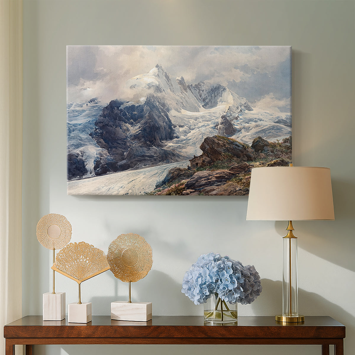 Canvas art print featuring a realistic landscape of high mountain under open sky, displayed above a styled console table