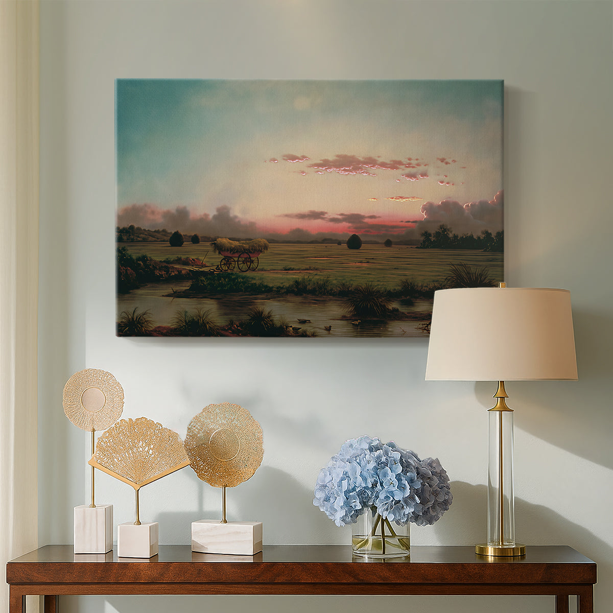 Canvas art print featuring a luminist scene with reflective water, displayed above a styled console table