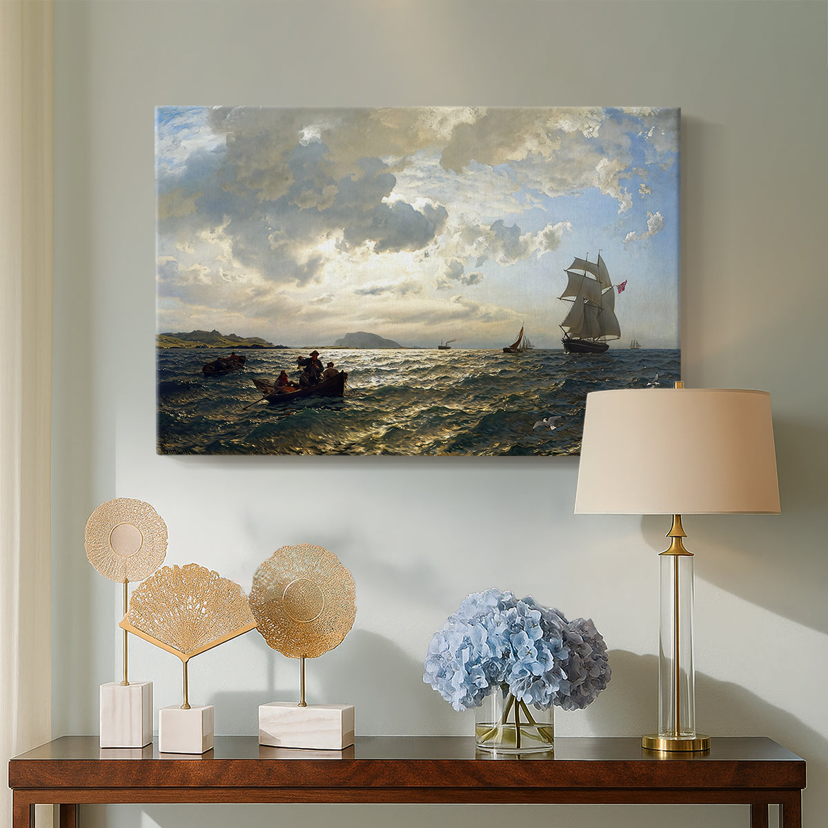 Canvas art print featuring a nautical landscape with boats in light coastal wind, displayed above a styled console table