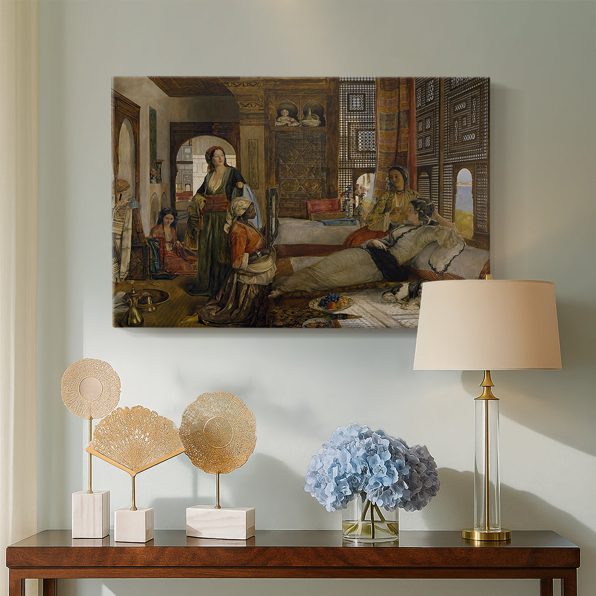 Canvas art print featuring a Victorian depiction of indoor gathering, displayed above a styled console table