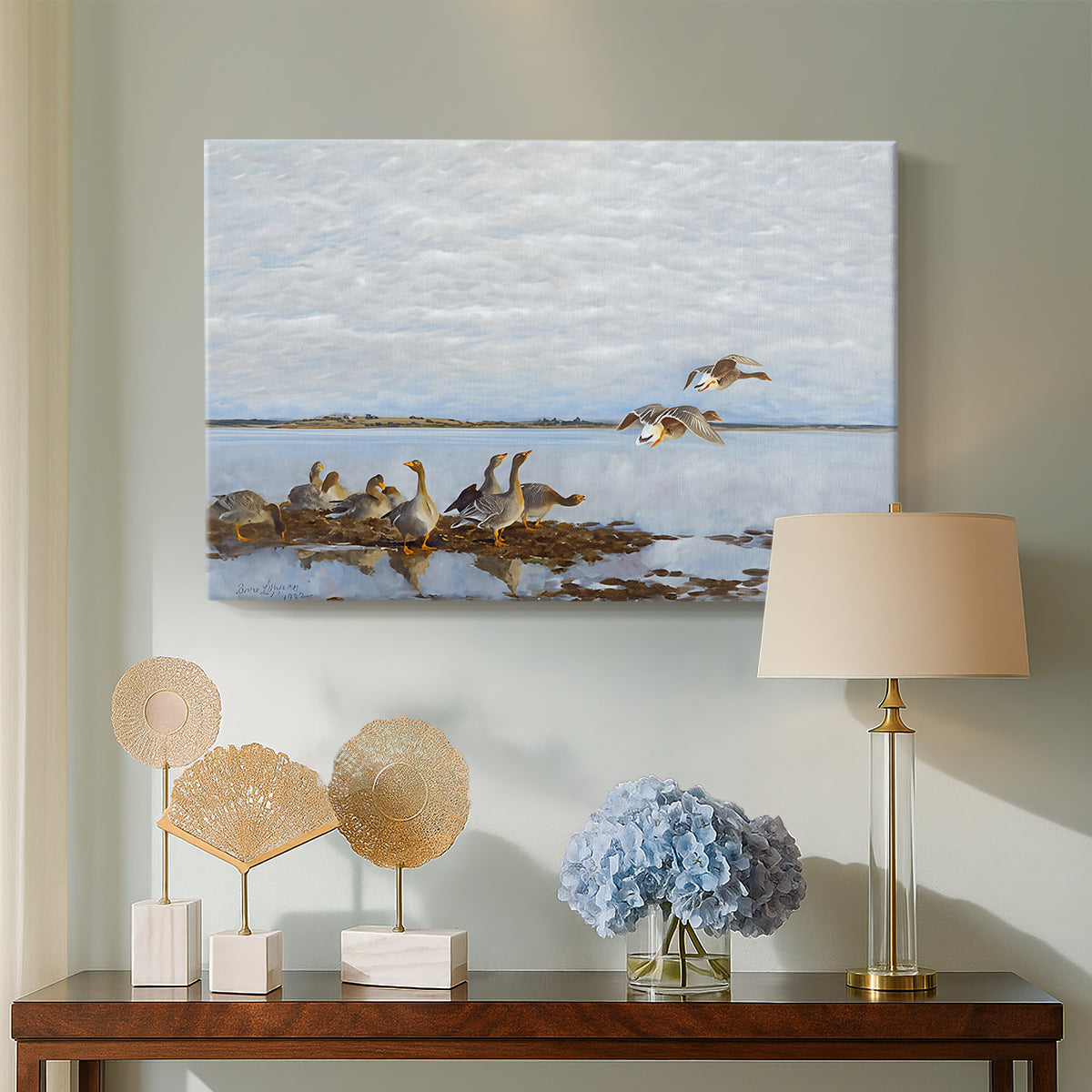 Canvas art print featuring a realistic wildlife scene of geese in calm outdoor environment, displayed above a styled console table