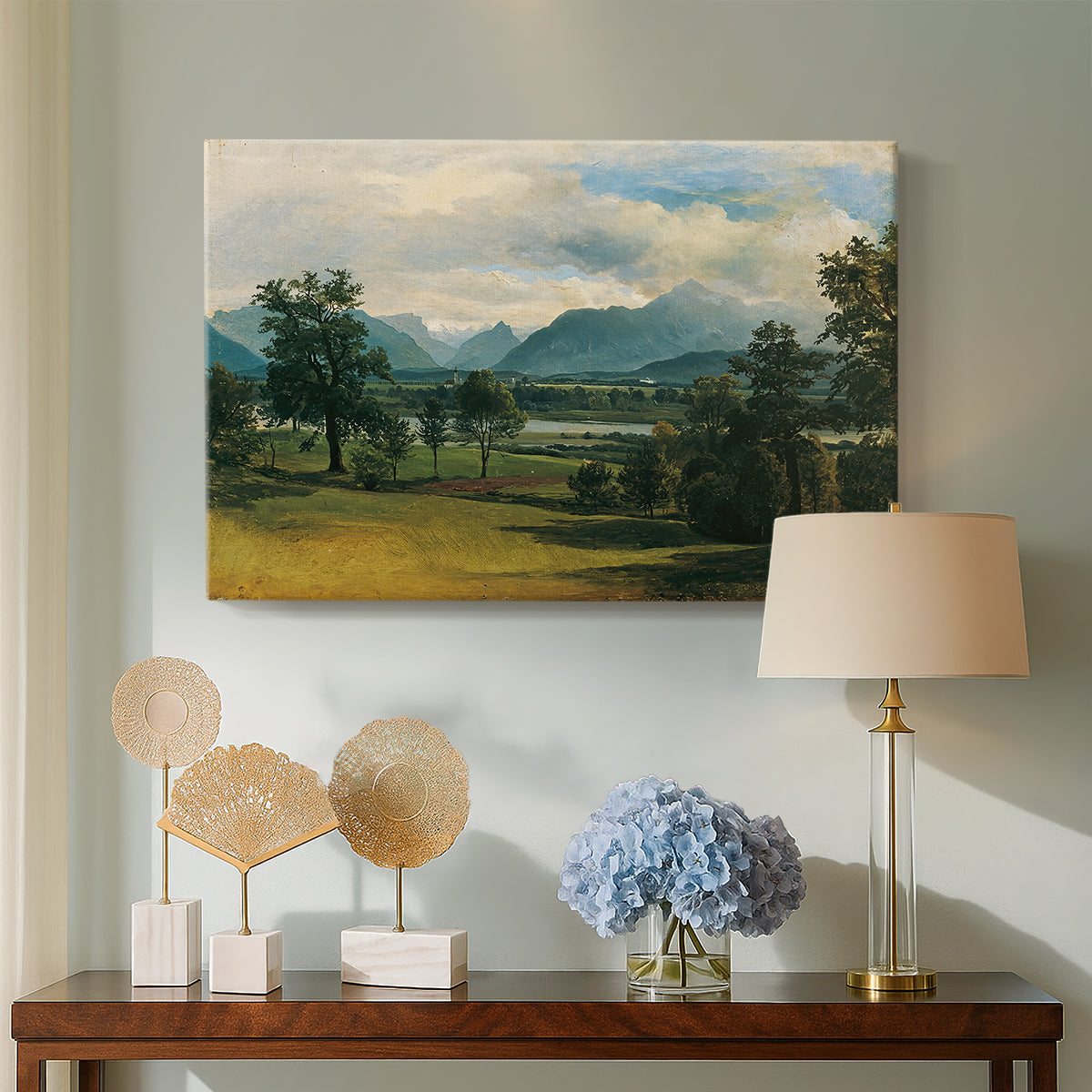 Canvas art print featuring a realist landscape with depth, displayed above a styled console table