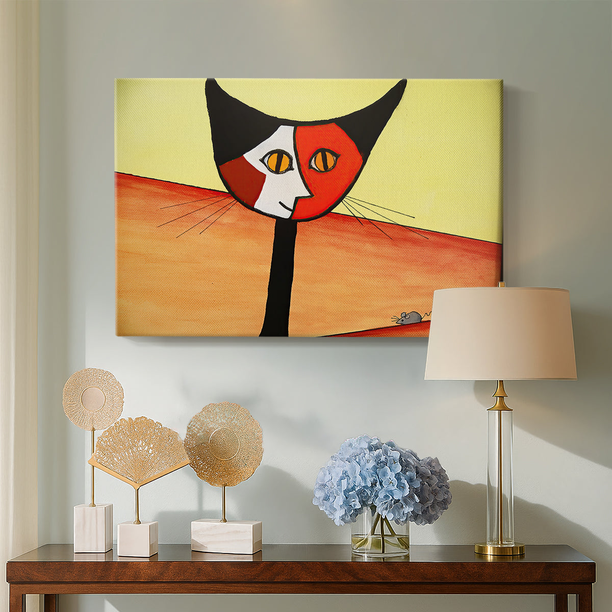 Canvas art print featuring an abstract animal with vivid color blocks, displayed above a styled console table