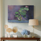 Canvas art print featuring a close-up plant study with bold color contrast, displayed above a styled console table