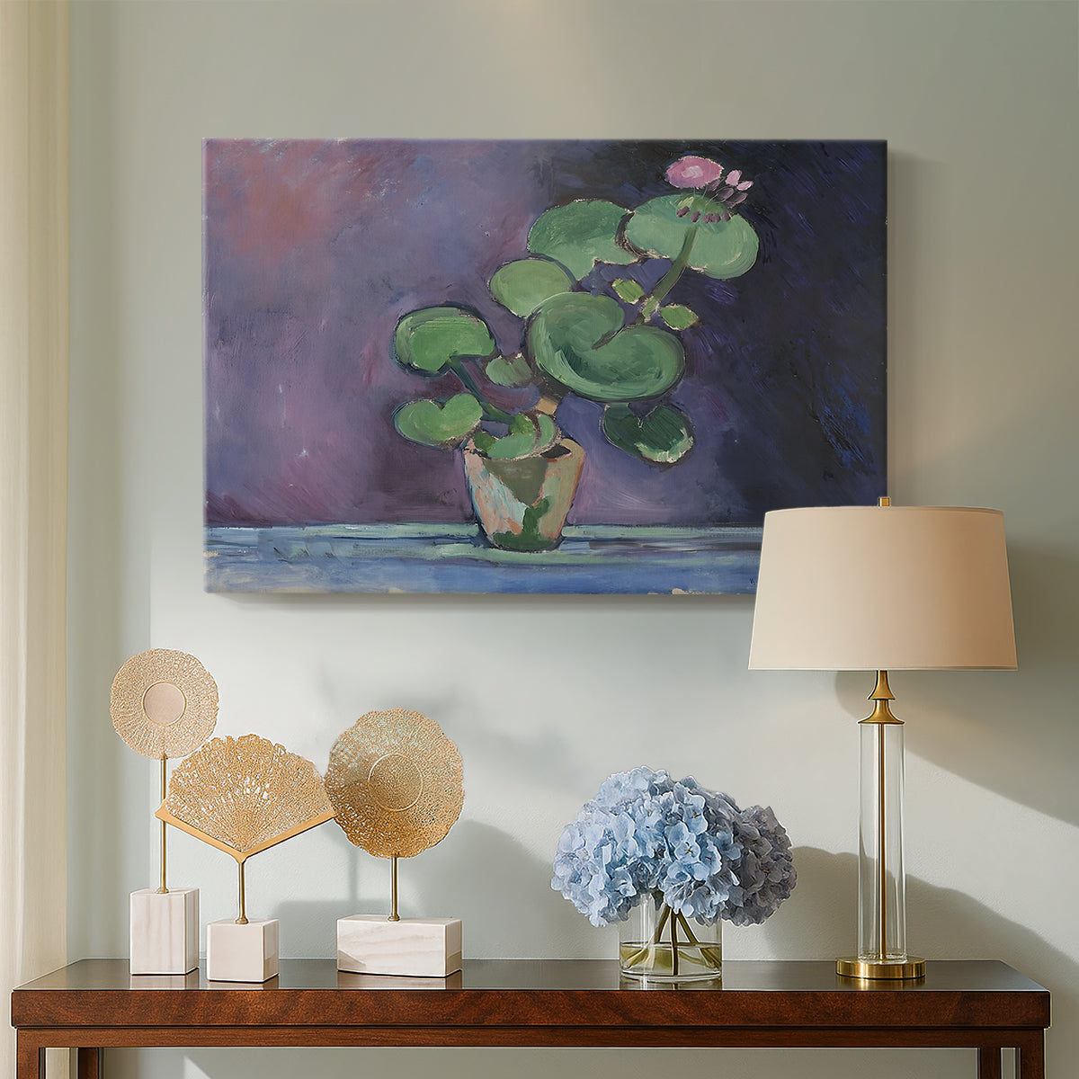 Canvas art print featuring a close-up plant study with bold color contrast, displayed above a styled console table