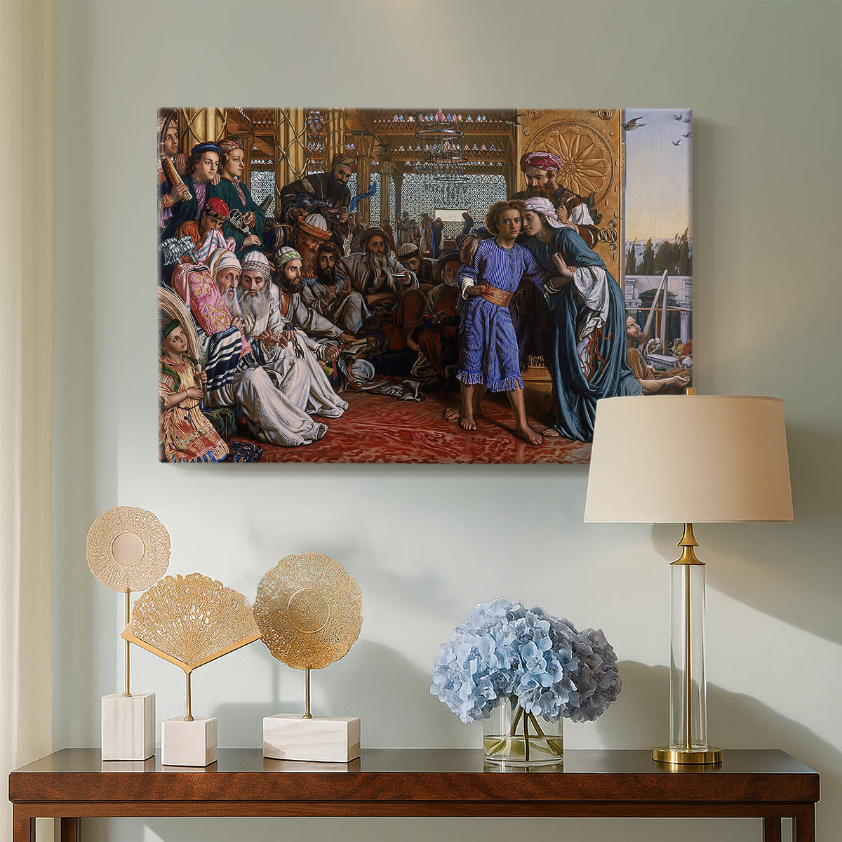 Canvas art print featuring a religious scene with figures arranged in architectural space, displayed above a styled console table