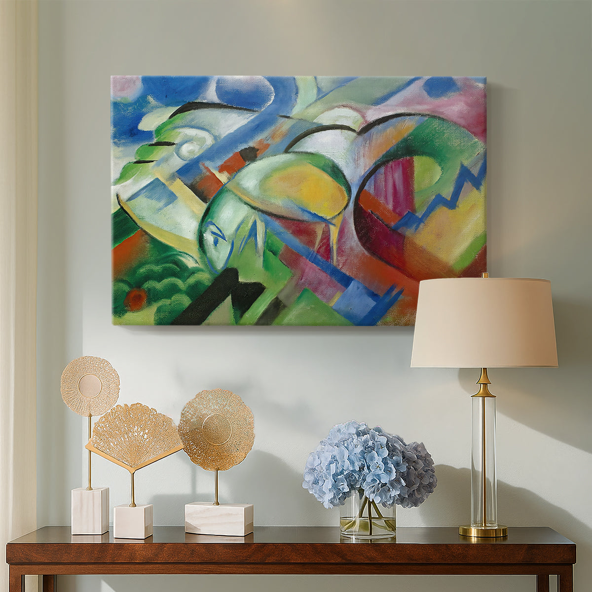 Canvas art print featuring an expressionist composition blending animals with environment, displayed above a styled console table