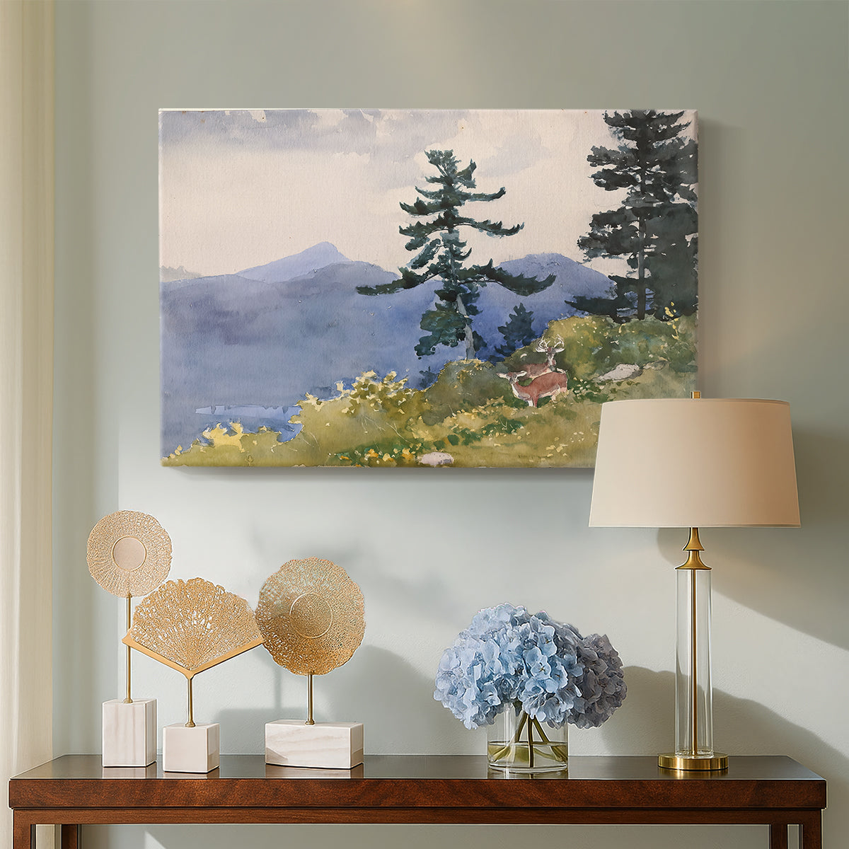 Canvas art print featuring a rustic scene showing building within forest environment, displayed above a styled console table