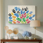 Canvas art print featuring an expressive abstract design of shapes, displayed above a styled console table