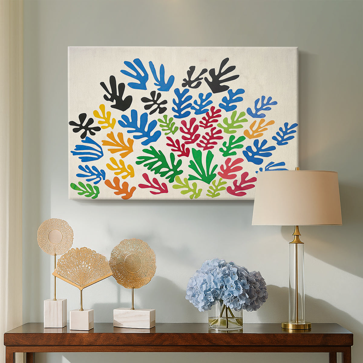 Canvas art print featuring an expressive abstract design of shapes, displayed above a styled console table