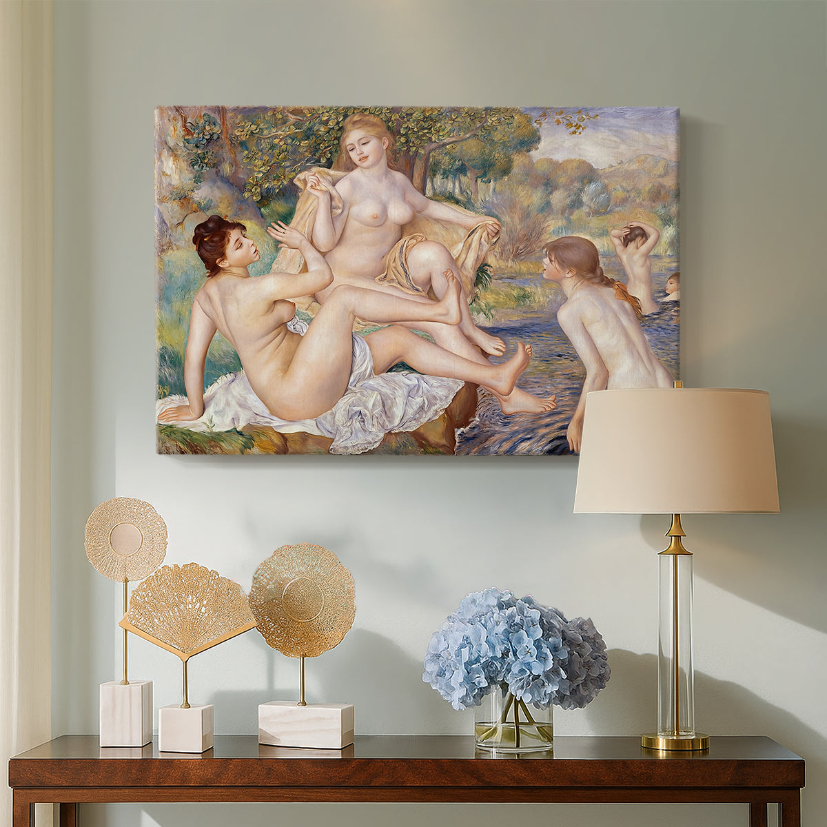 Canvas art print featuring a classical-inspired composition of nude figures in lush riverside setting, displayed above a styled console table