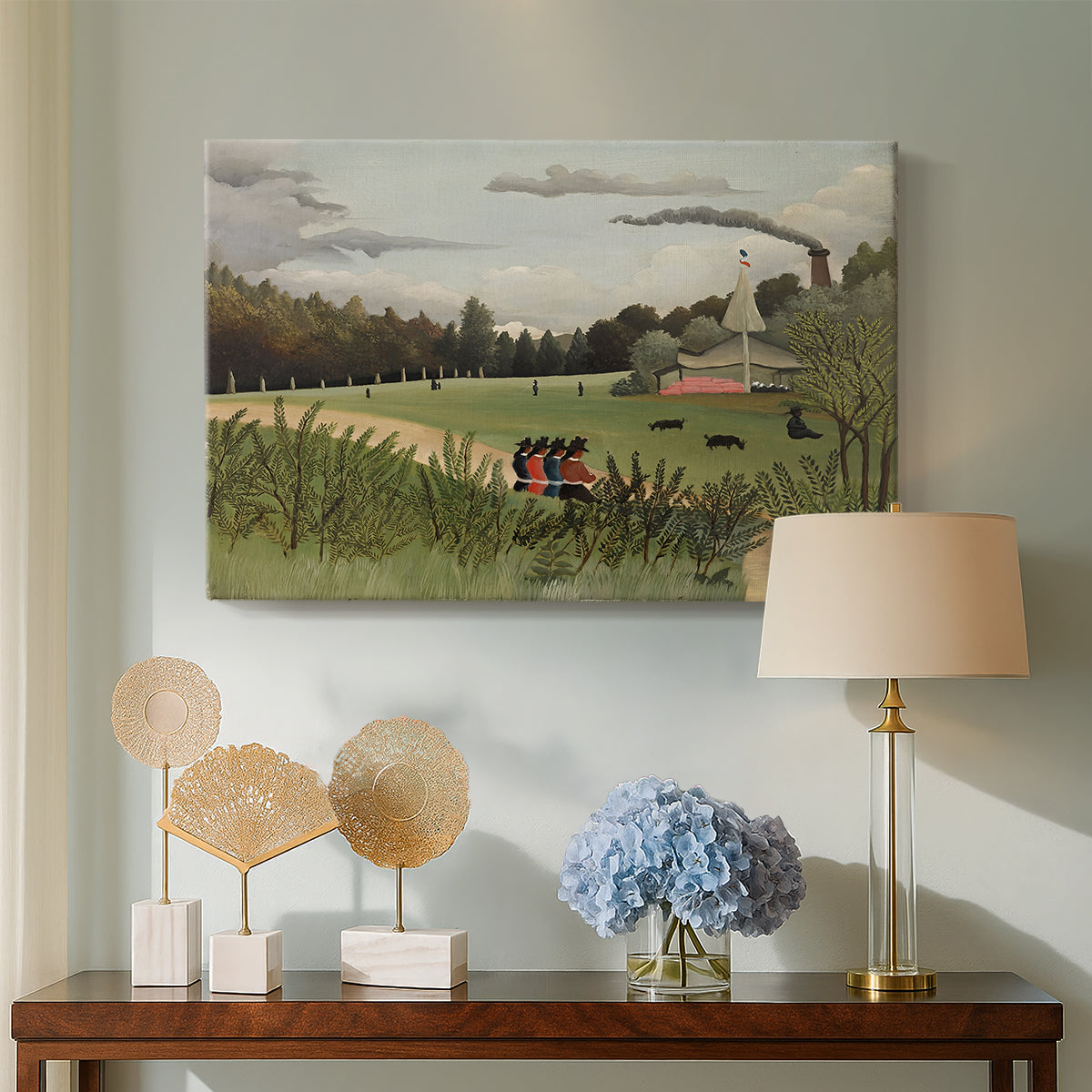 Canvas art print featuring a simplified industrial landscape with activity and buildings, displayed above a styled console table