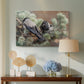 Canvas art print featuring a realistic scene of crows interacting on grassy terrain, displayed above a styled console table