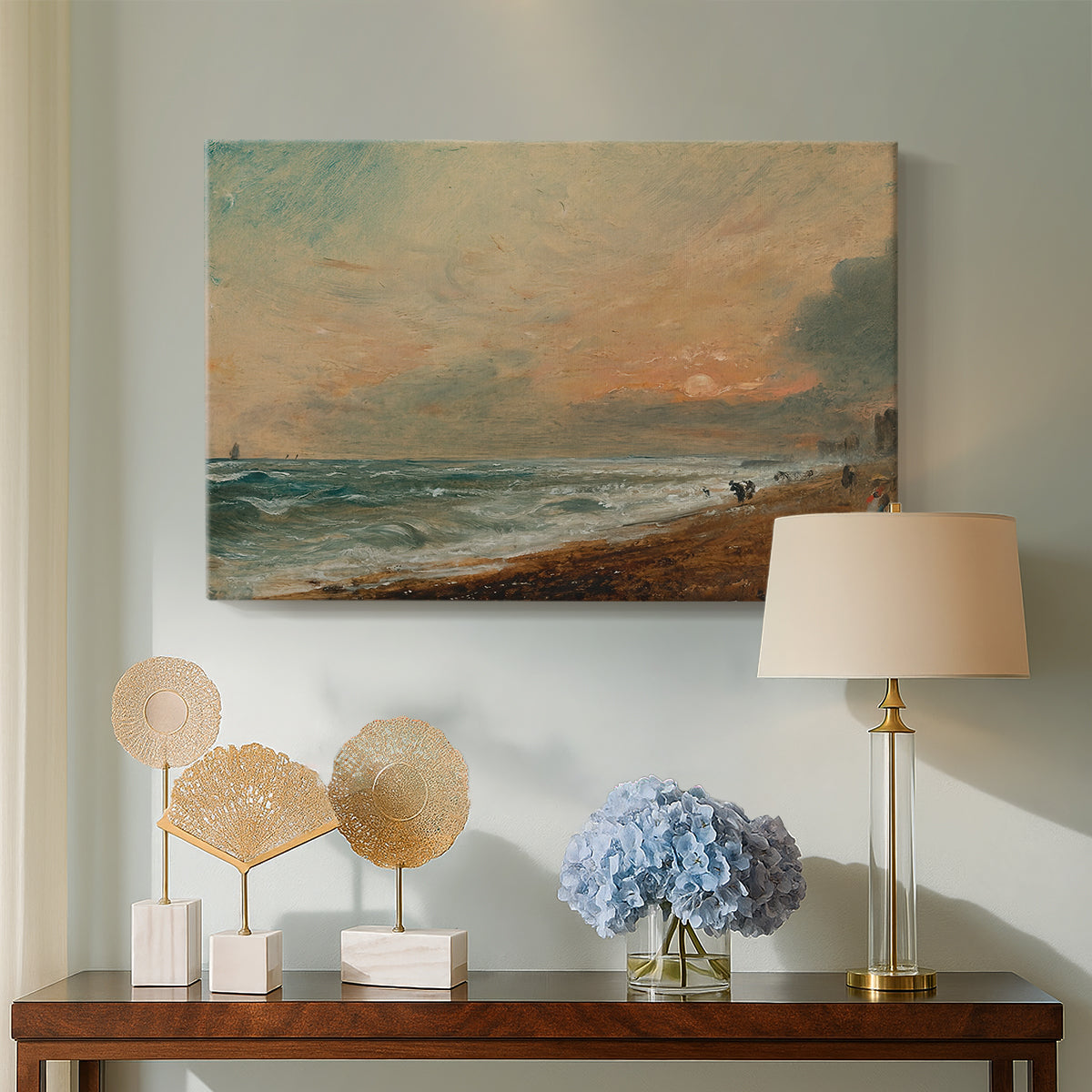 Canvas art print featuring an atmospheric coastal view with horizon, displayed above a styled console table
