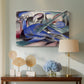 Canvas art print featuring an abstract horse form rendered with soft curves and vivid tones, displayed above a styled console table