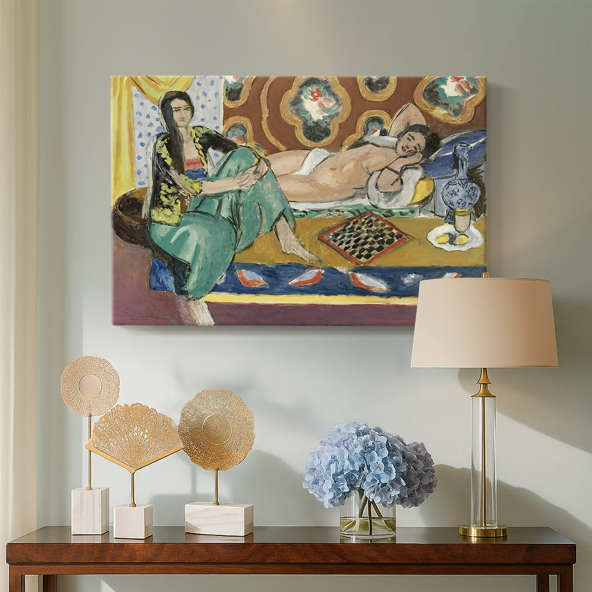 Canvas art print featuring a Fauvist composition of two seated figures at play, displayed above a styled console table