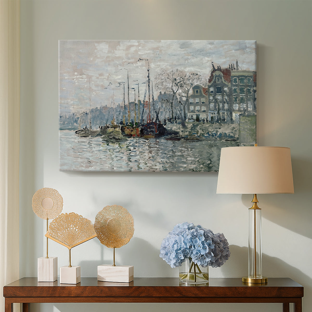 Canvas art print featuring an urban waterway with docked boats and European buildings, displayed above a styled console table