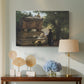 Canvas art print featuring a solemn scene with priest near historical monument, displayed above a styled console table