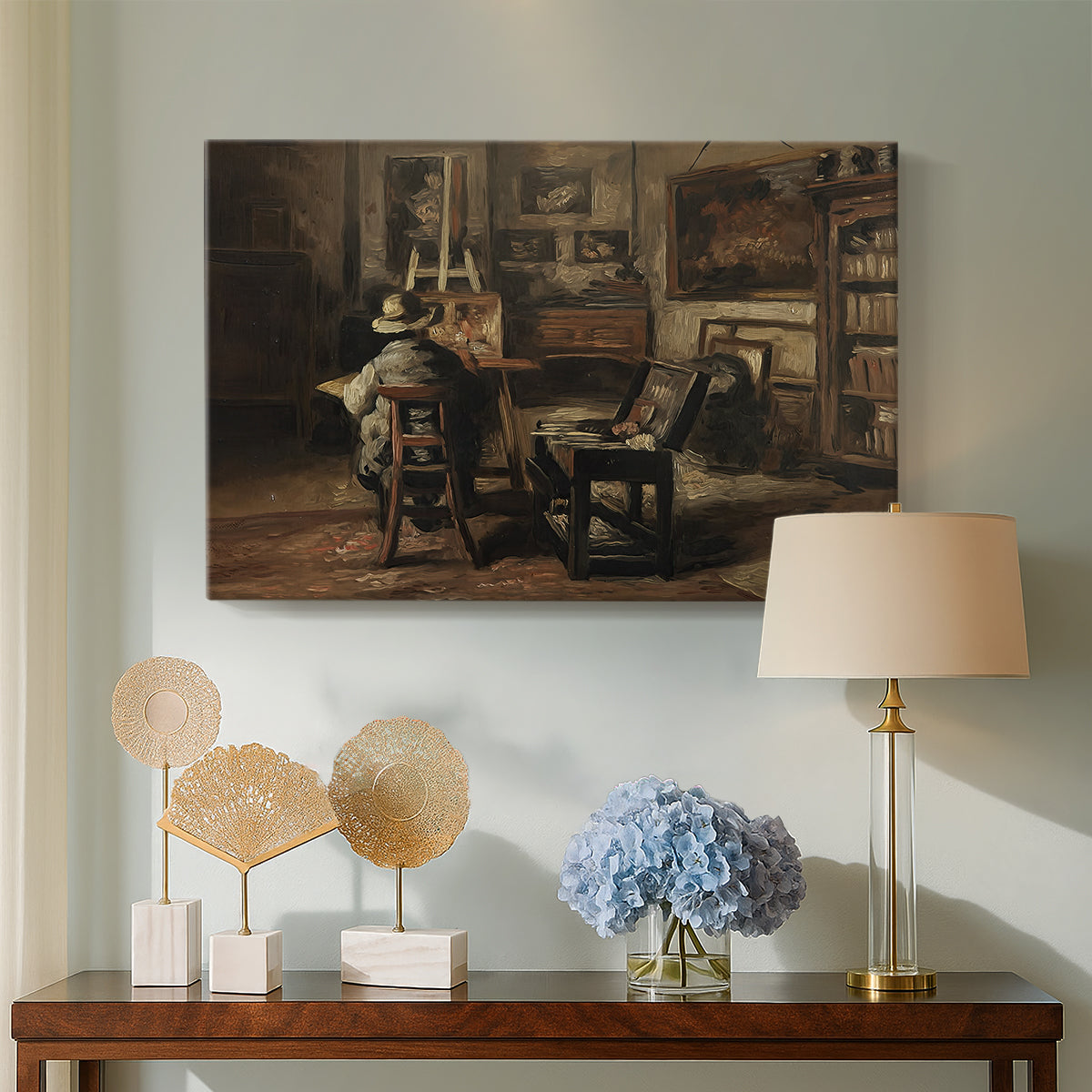 Canvas art print featuring an interior scene showing workspace with easel and furnishings, displayed above a styled console table