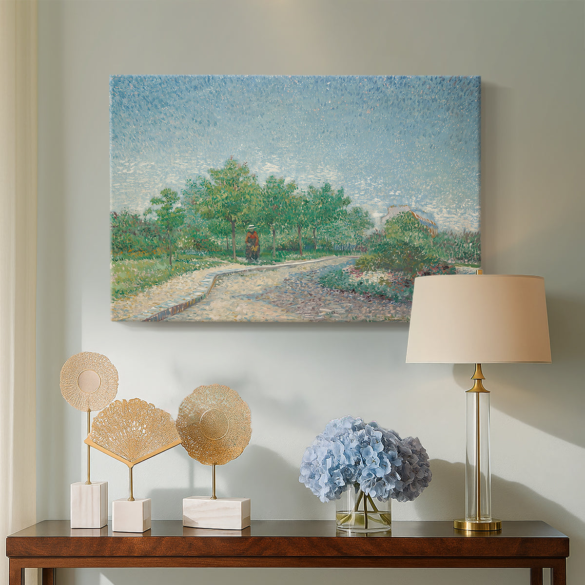 Canvas art print featuring a post-impressionist park scene with structured layout, displayed above a styled console table