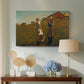 Canvas art print featuring a countryside composition with figures positioned near simple structure, displayed above a styled console table